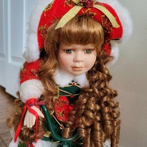 Vintage Porcelain doll on bike